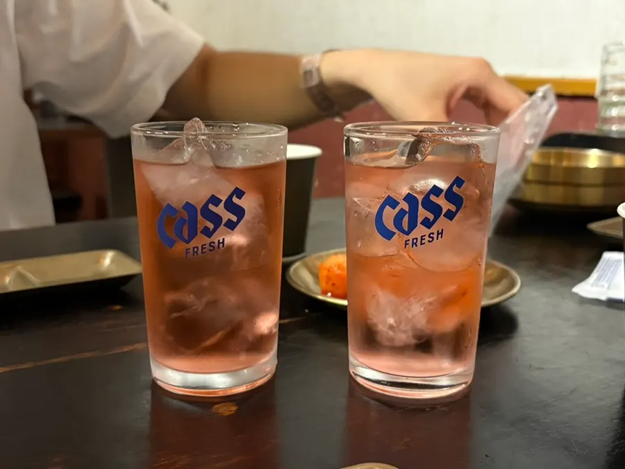 A glass of omija wine served as a welcome drink
