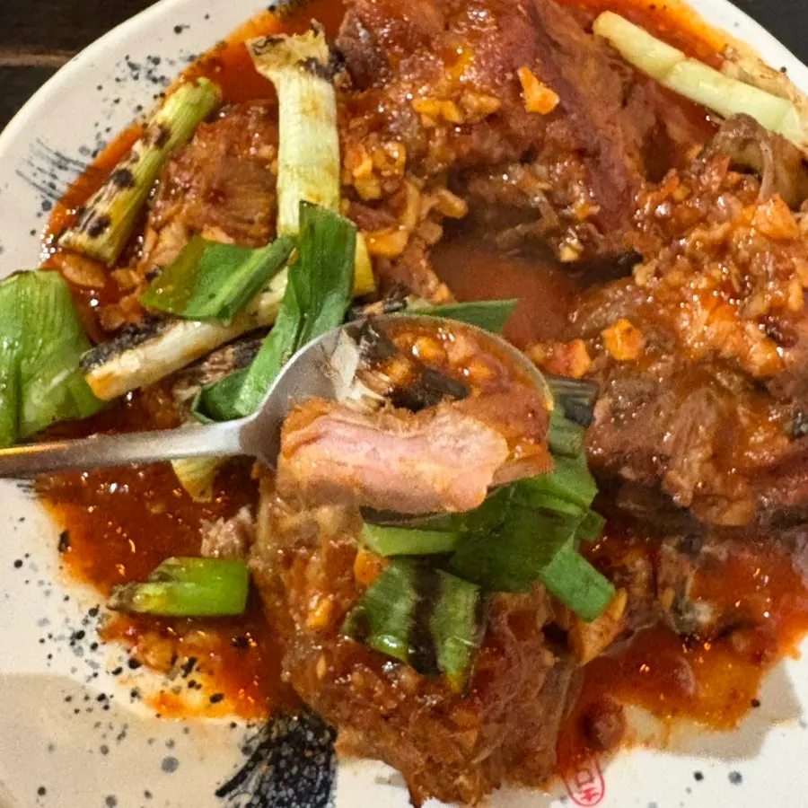 A piece of meat pulled off the bone
