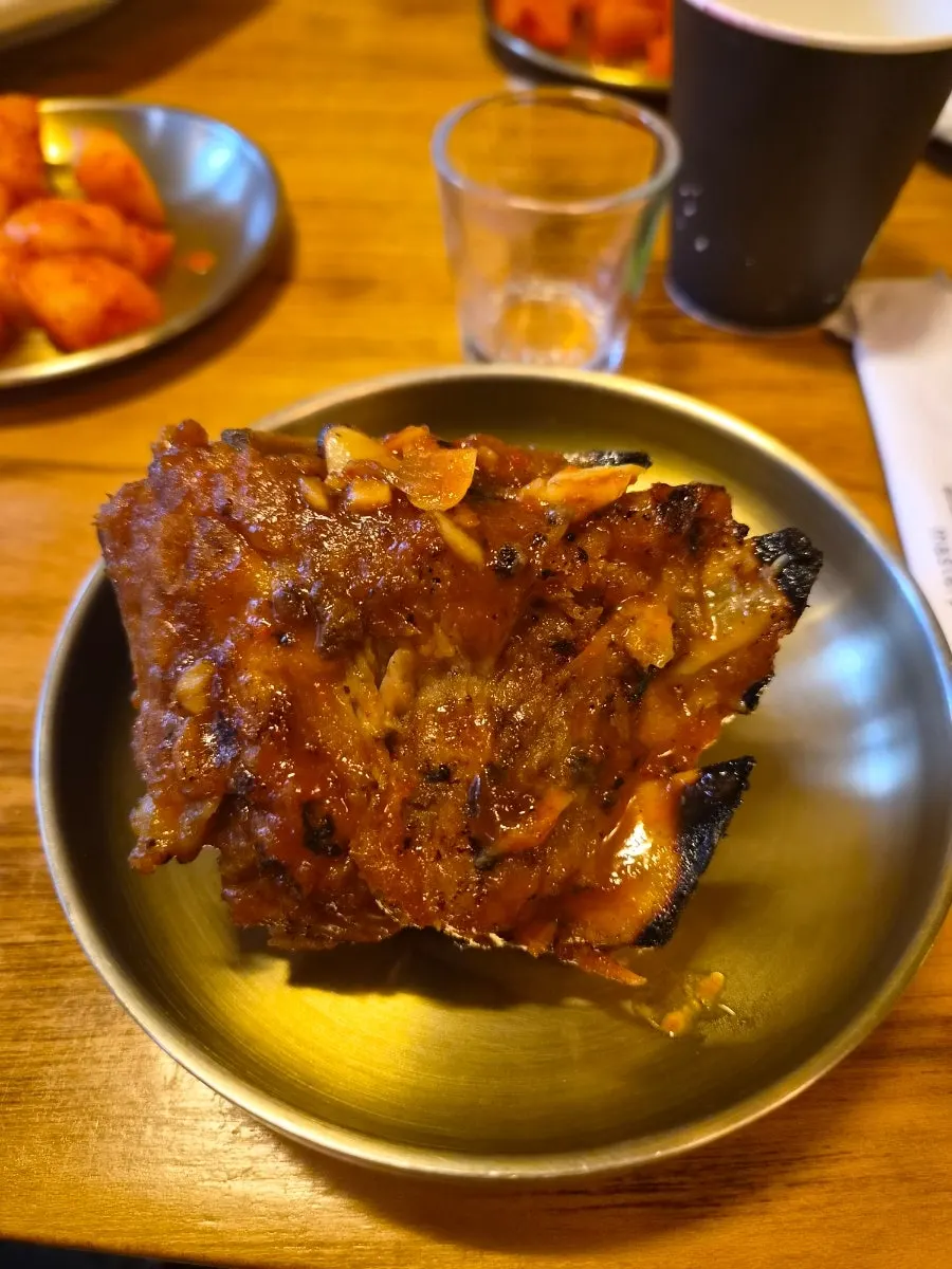 Charcoal bone BBQ with plenty of meat attached to the bone