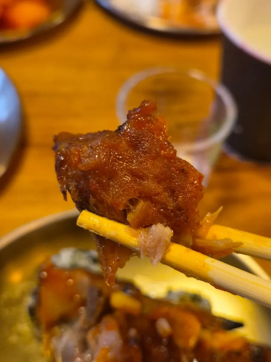 A piece of meat picked off the bone BBQ