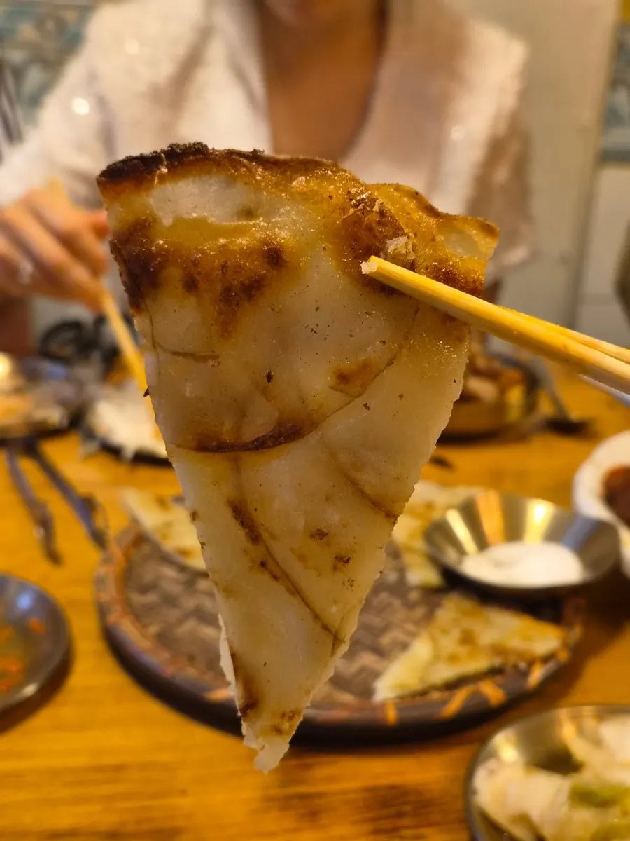 Sugar-salt powder served with the potato pancake