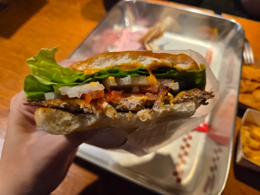 A bite of the clean, light-style BAS Burger