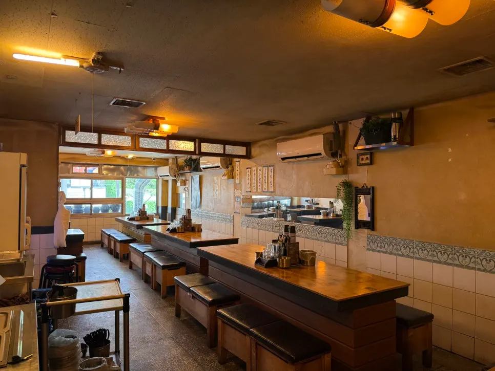 Open kitchen view of bones being grilled