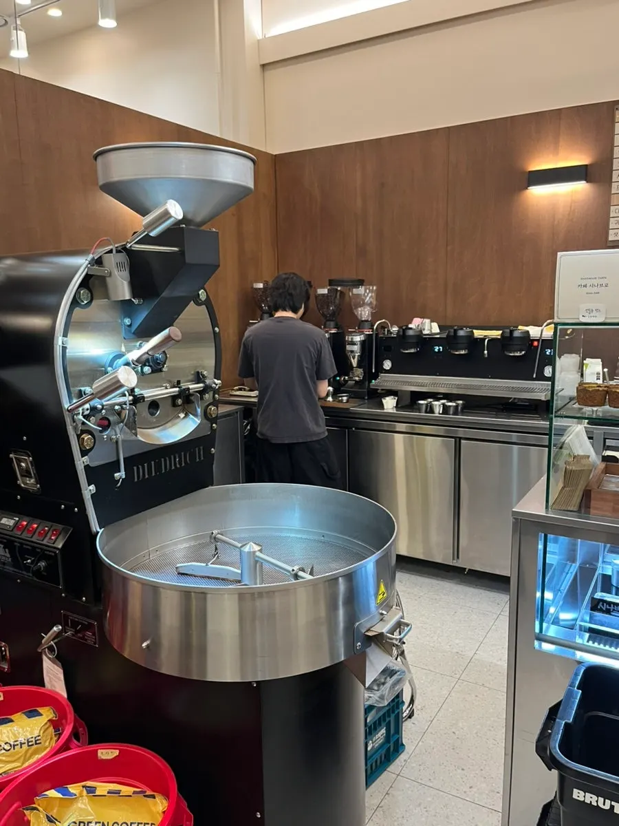 Interior of Cafe Sinabro with today's bean information posted