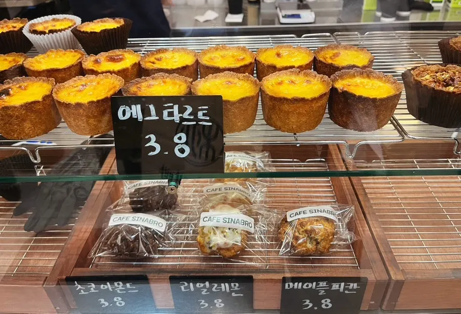 Chocolate, lemon, and pecan scones on display