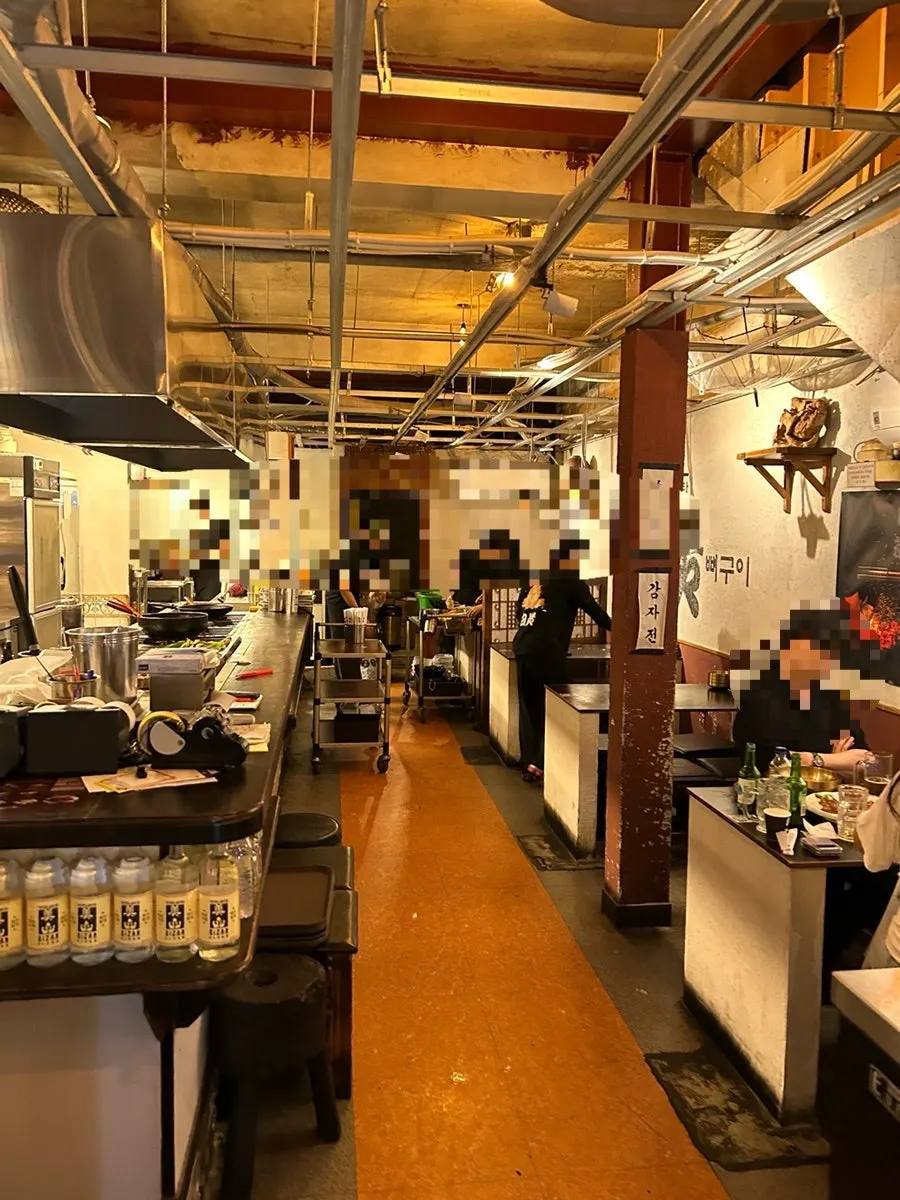 Self-service utensil corner between tables