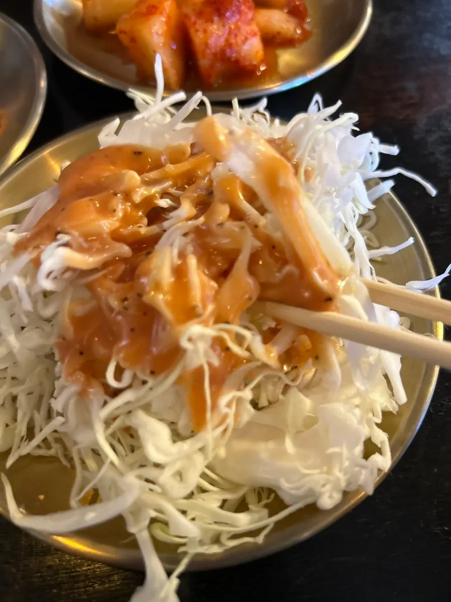 Side dishes: baek-kimchi, kkakdugi, and cabbage salad