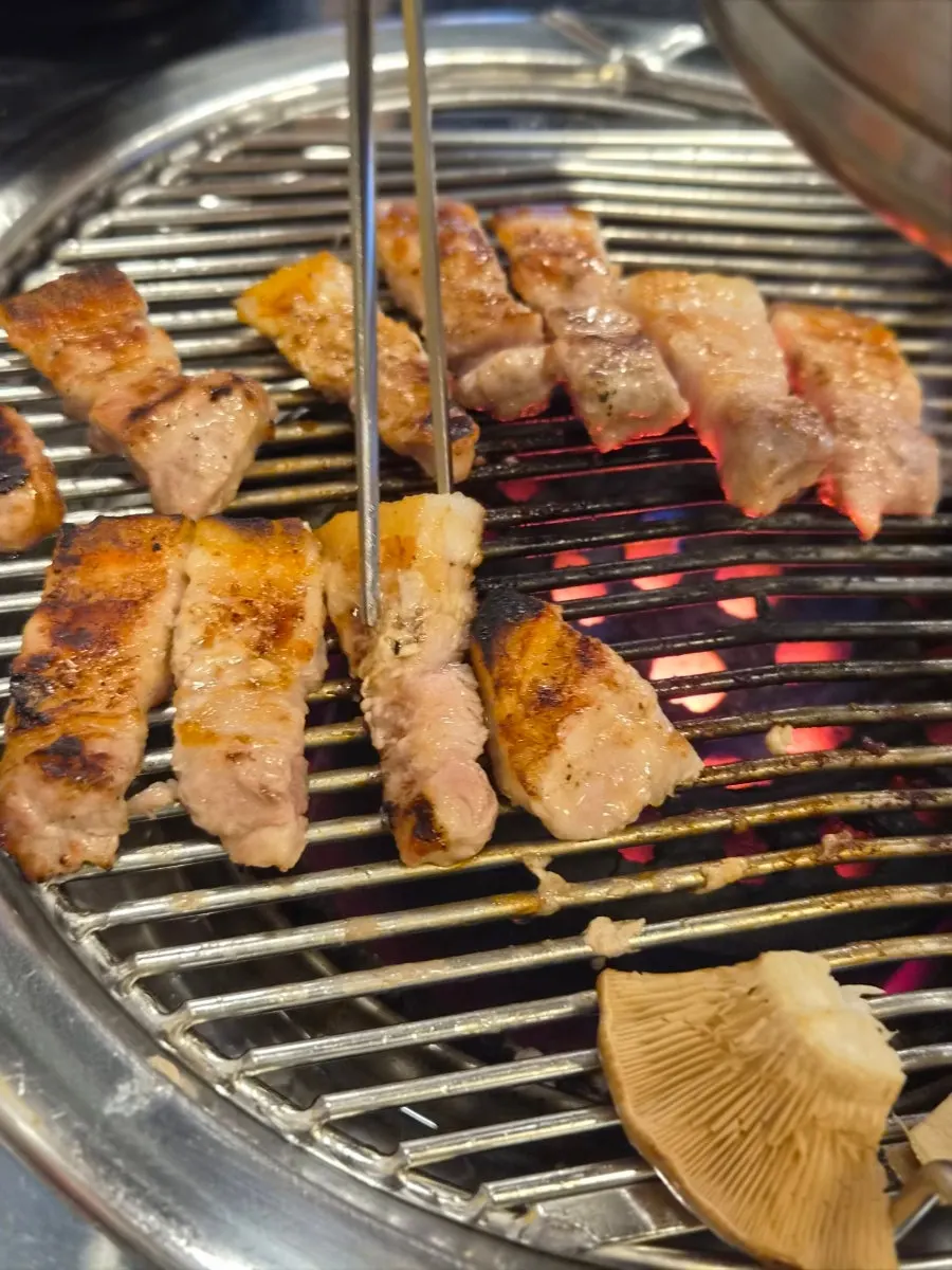 The charcoal grill pan the couple ate from slowly