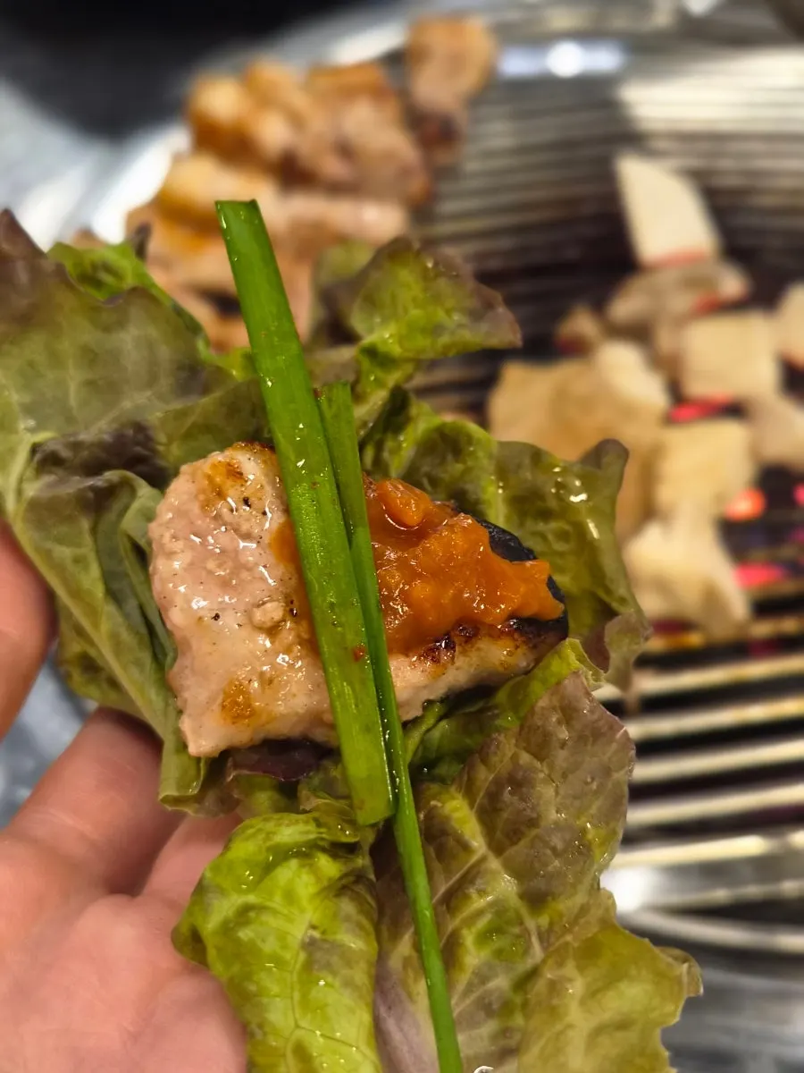 The last piece of charcoal-grilled meat