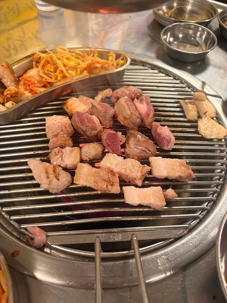 Grill plate with meat still cooking