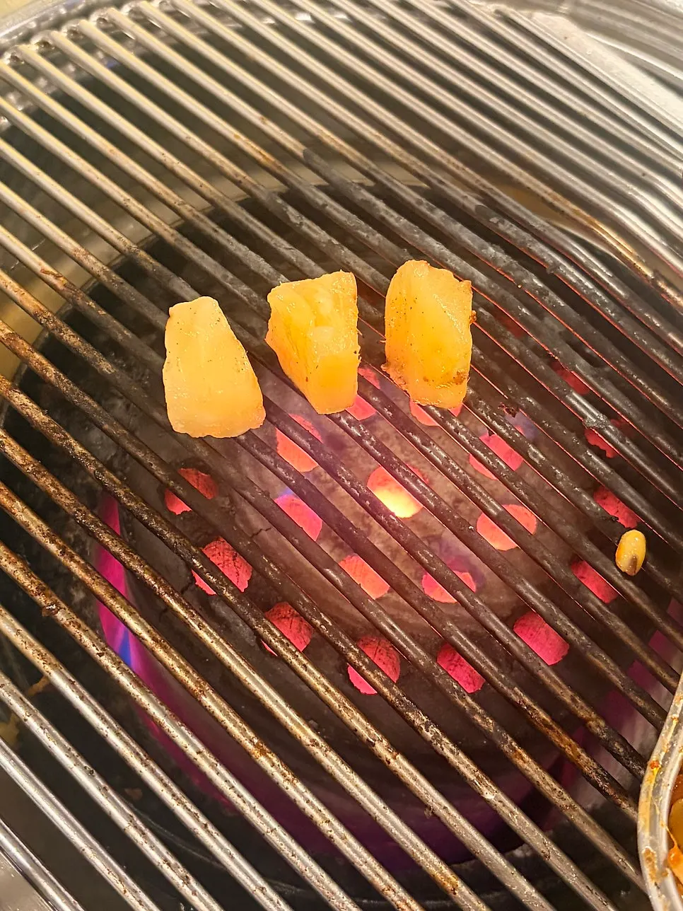 Pineapple grilled over charcoal