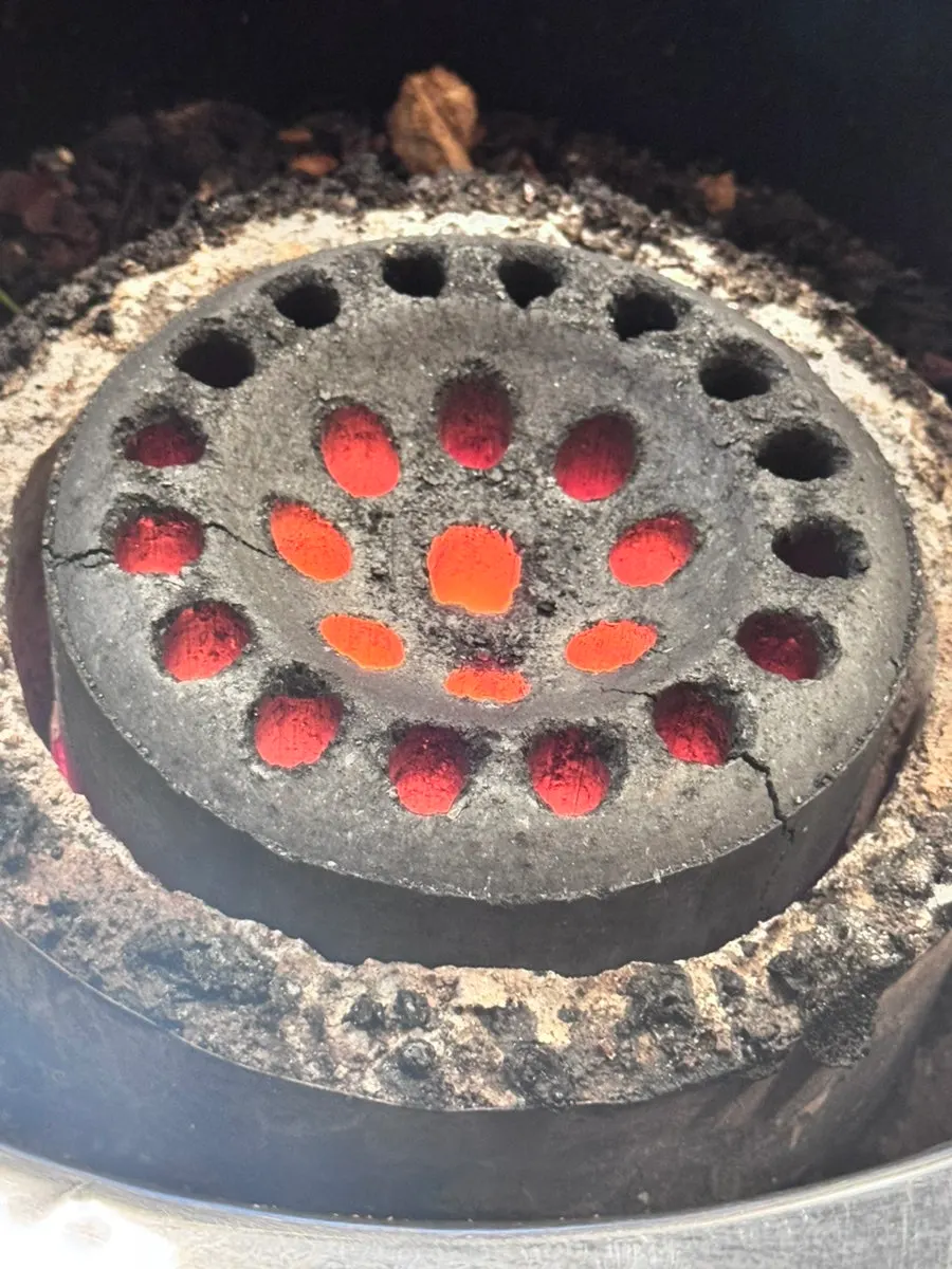 Table with the charcoal grill set up