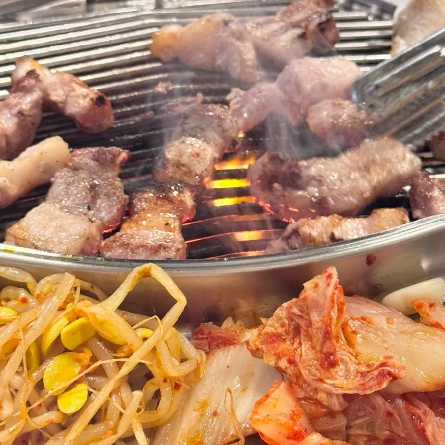 Golden-brown charcoal-grilled pork belly