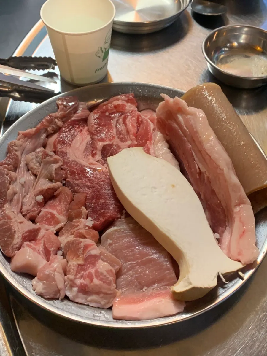 Assorted pork cuts with a pinkish color