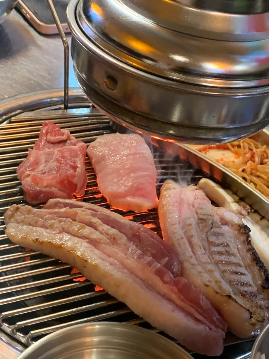 Pork belly and neck on the charcoal grill