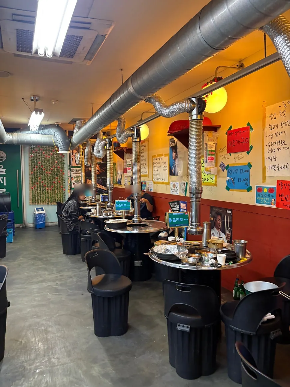 Storefront with a sign for grilled jumbo shrimp