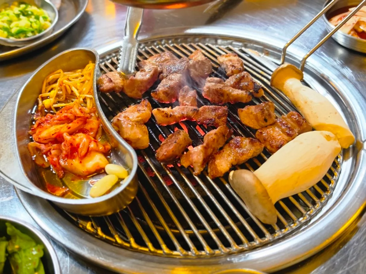 Thick charcoal-grilled pork cooked golden brown