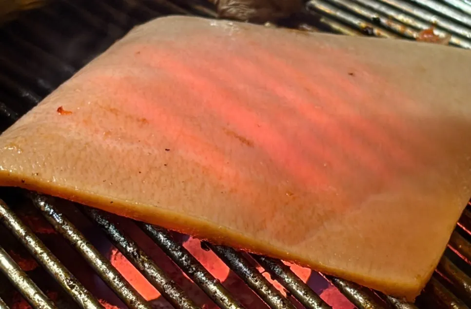 Pork skin grilled crisp over the charcoal fire