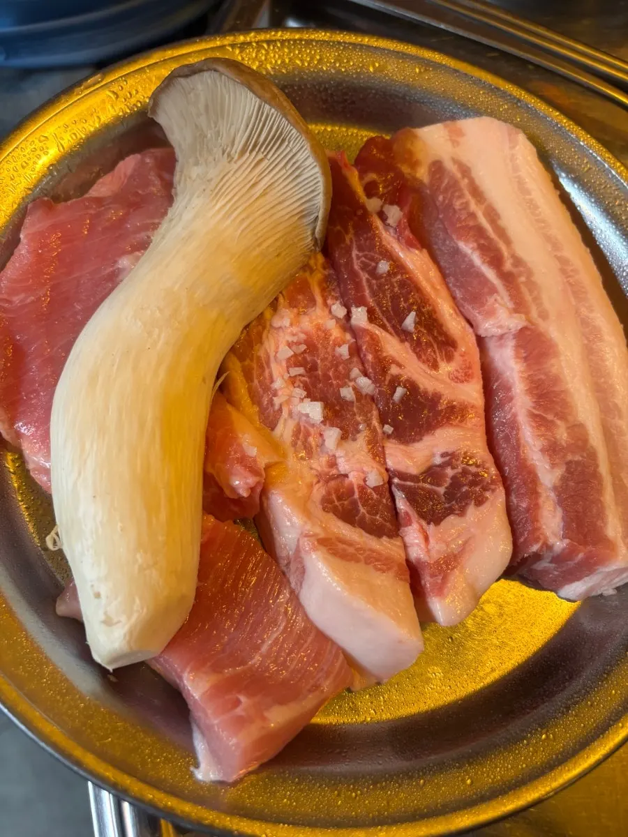 Plate of ordered pork belly, pork neck, and pork jowl