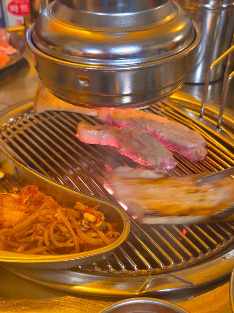 Meat placed on the charcoal grill