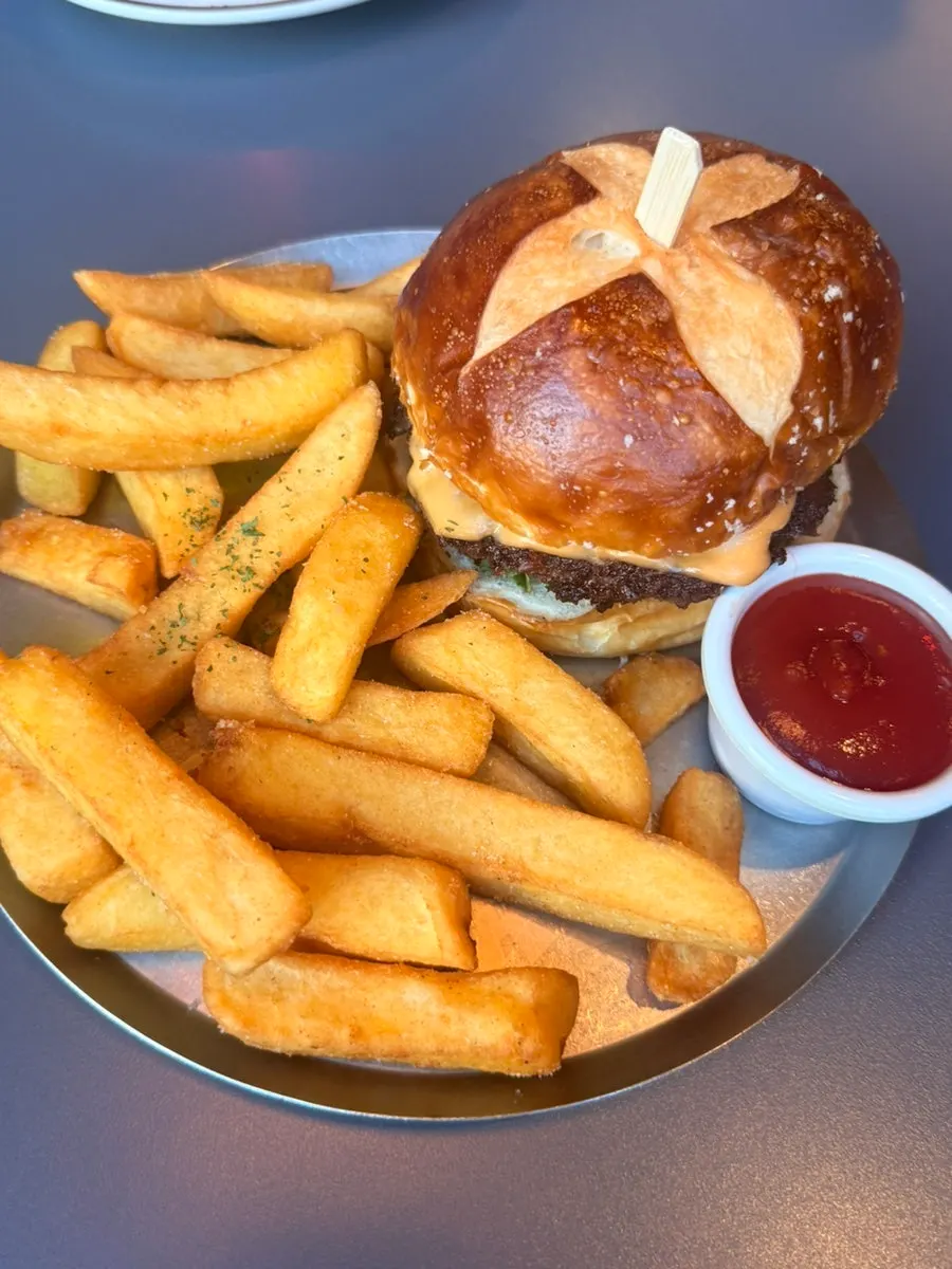 Classic Burger with the bun swapped for a pretzel bun