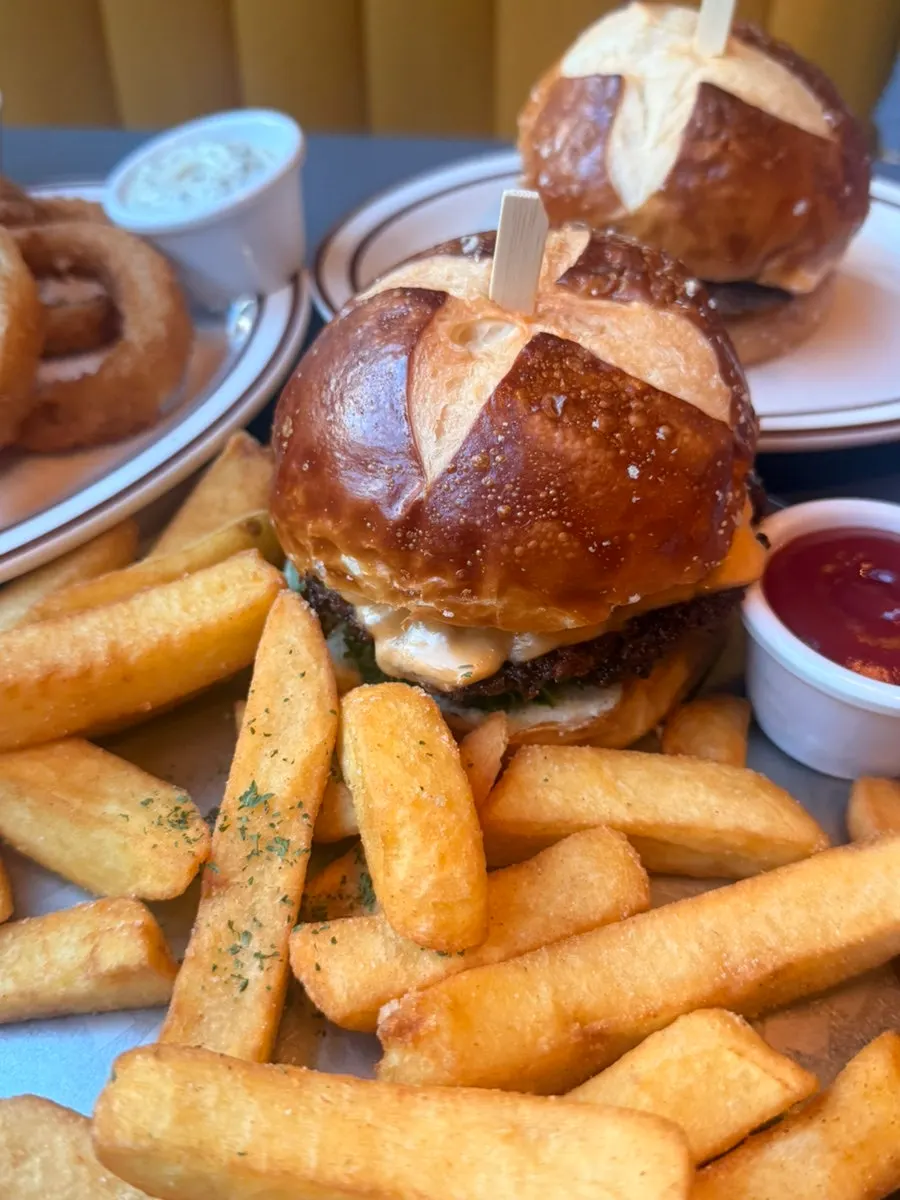 Classic Burger held up by hand