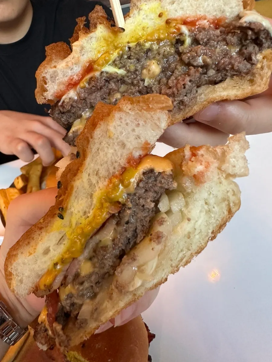 Close-up of the double-patty burger cross-section