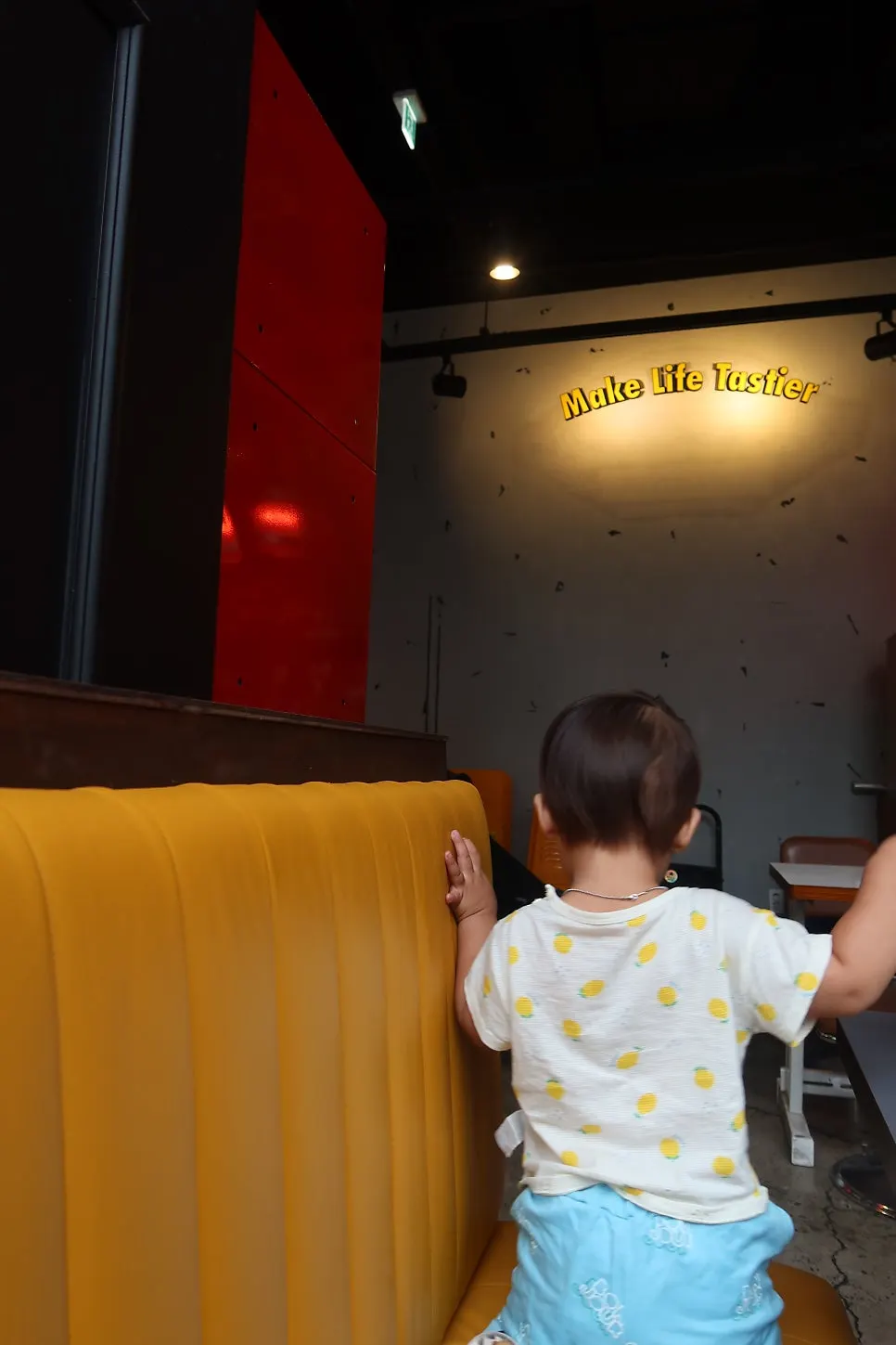 Eating handmade burgers with a baby