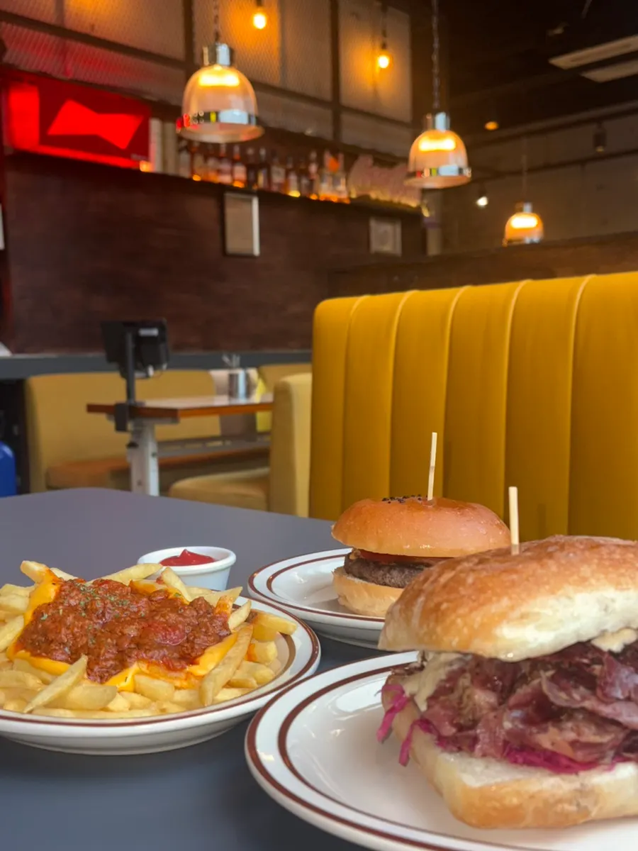 Order of a bacon cheeseburger and pastrami sandwich