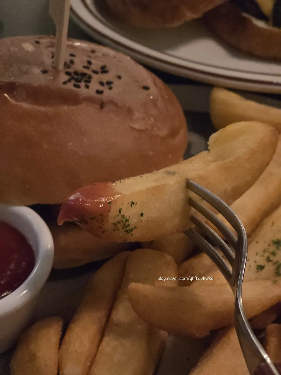Bacon cheeseburger and its toppings