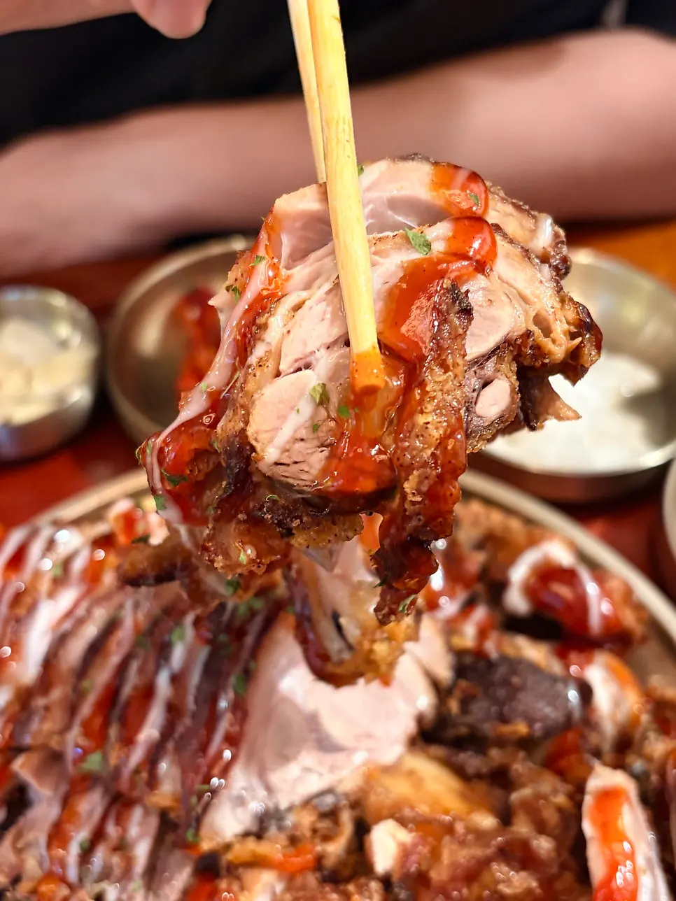 Fried jokbal drizzled with seasoned chicken sauce