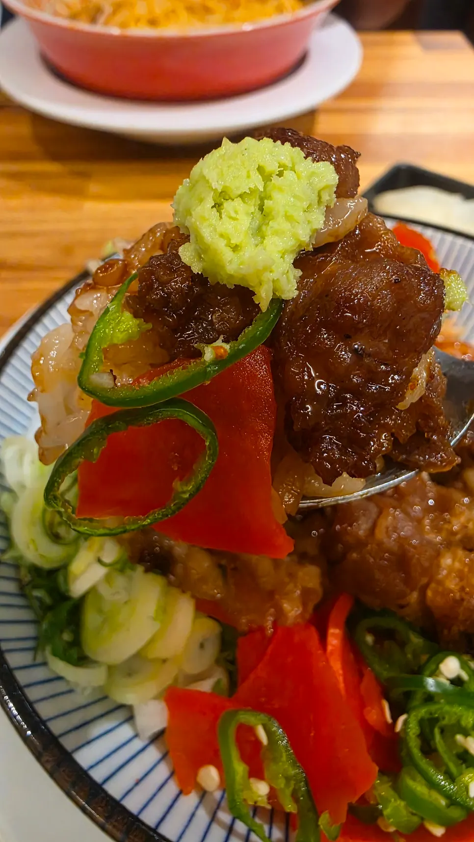Daechang rice bowl coated in tare sauce