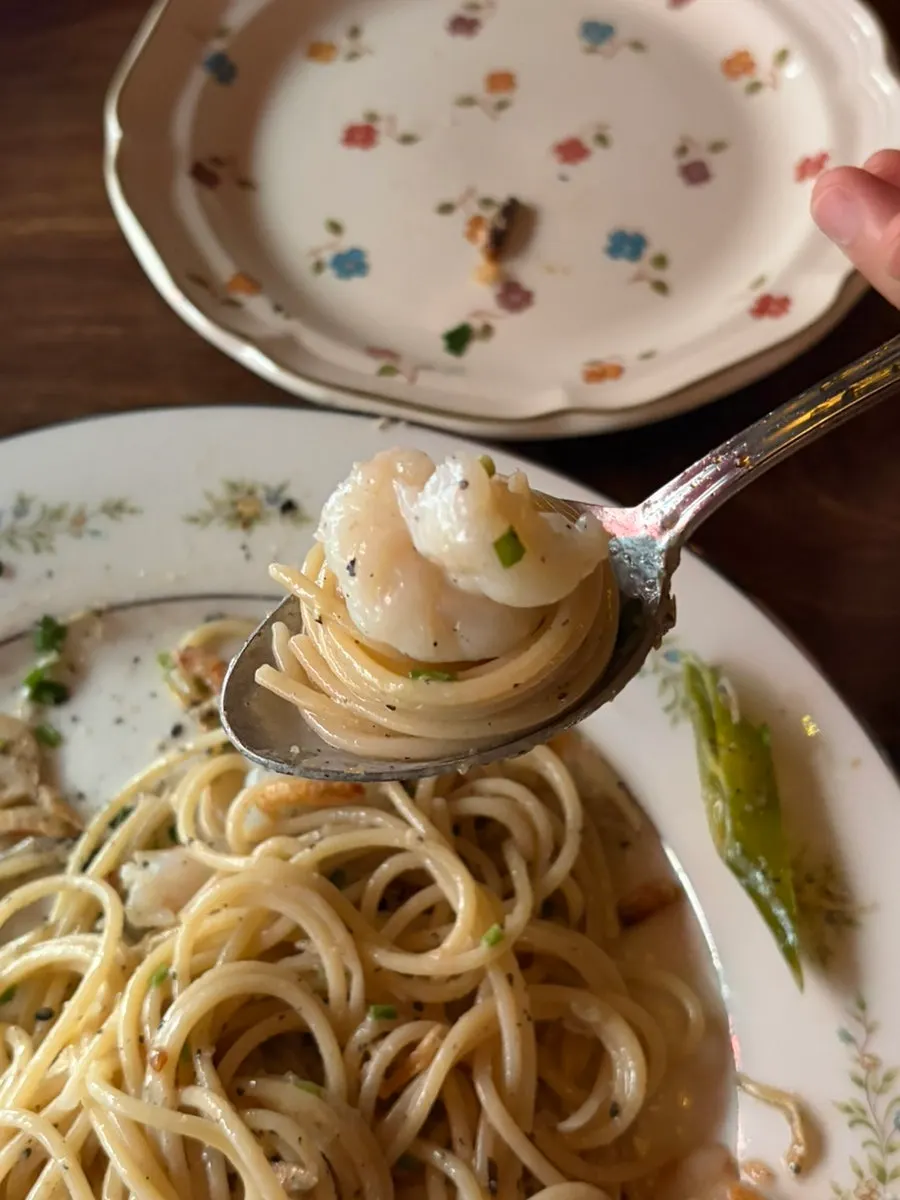 A bite of pasta and fried eoyang eggplant