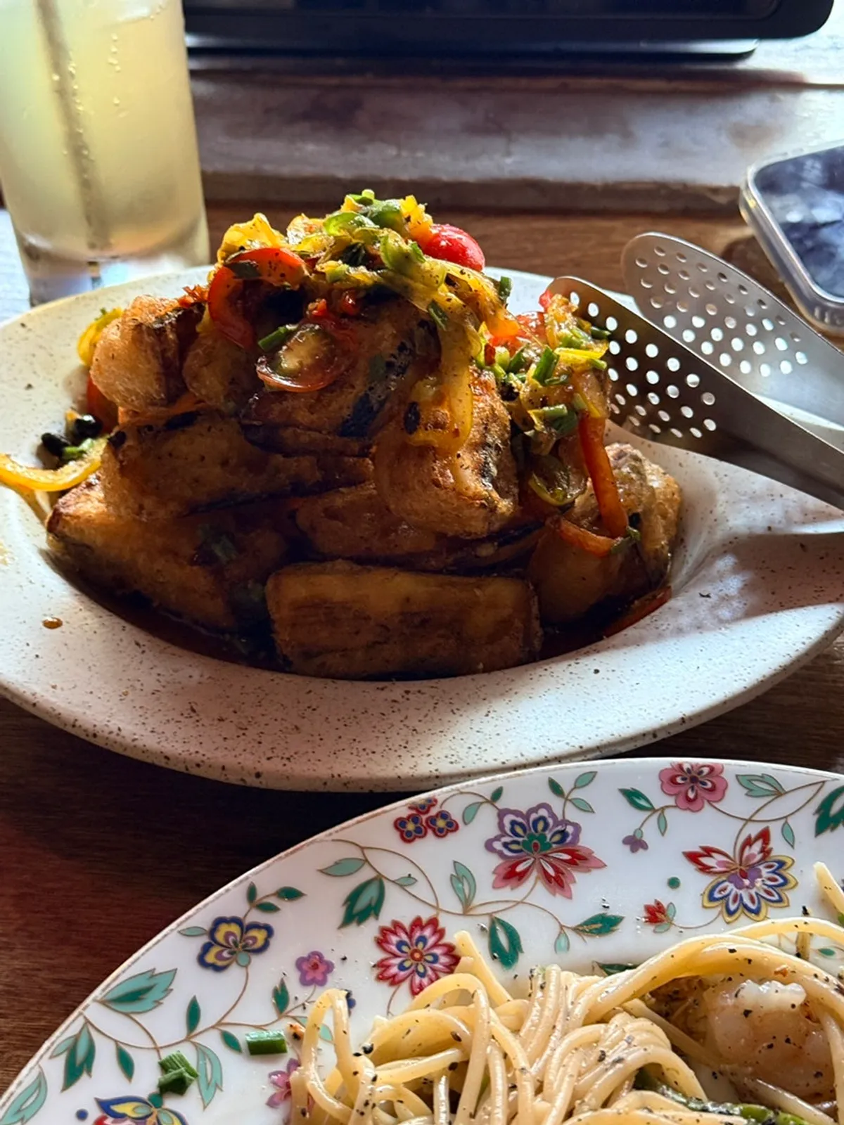Fried eggplant served with bell pepper