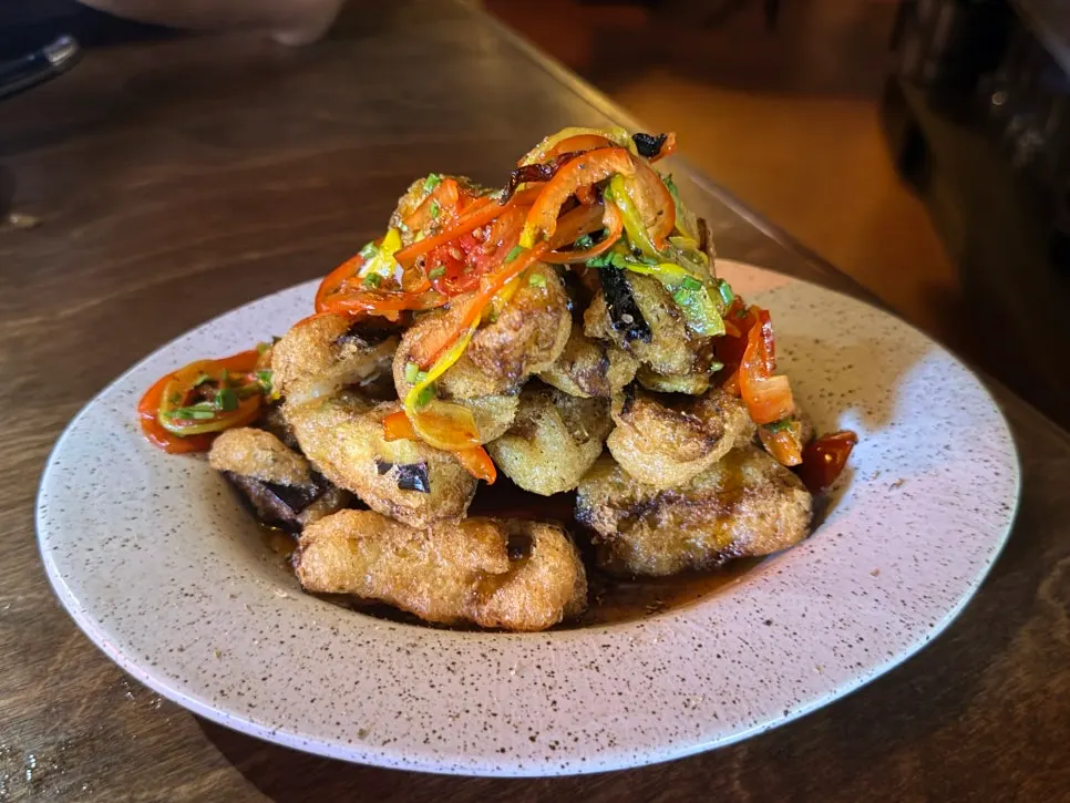 A plate of Sichuan Pepper Kick! Crispy Eggplant