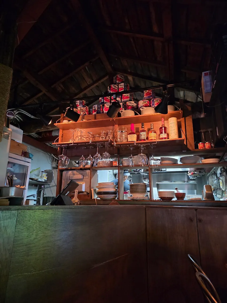 Dimly lit 2nd-floor interior like a cabin