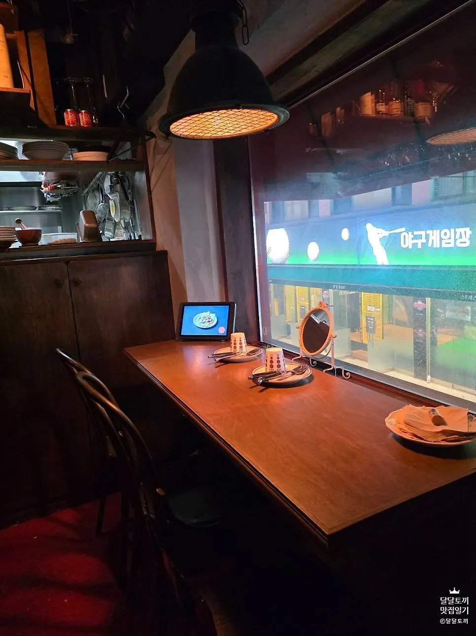 Widely spaced tables and bar table seating
