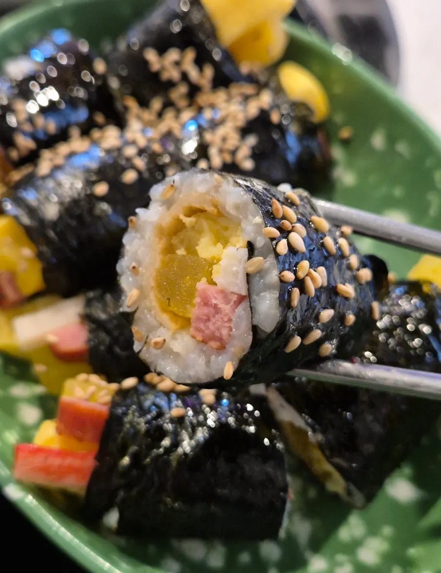 Mini gimbap sprinkled with sesame seeds