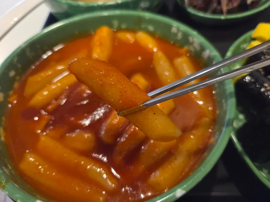 Broth-style tteokbokki ordered at medium spice level
