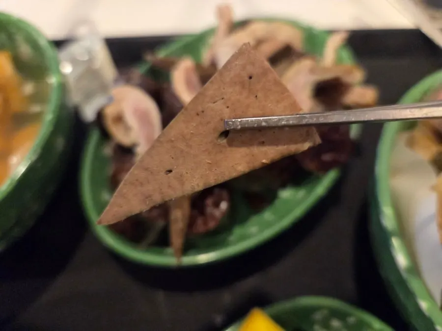 Close-up of glutinous rice sundae packed full inside