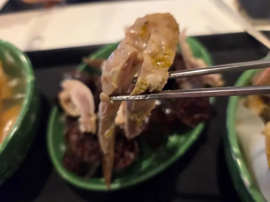 Glutinous rice sundae dipped in tteokbokki broth