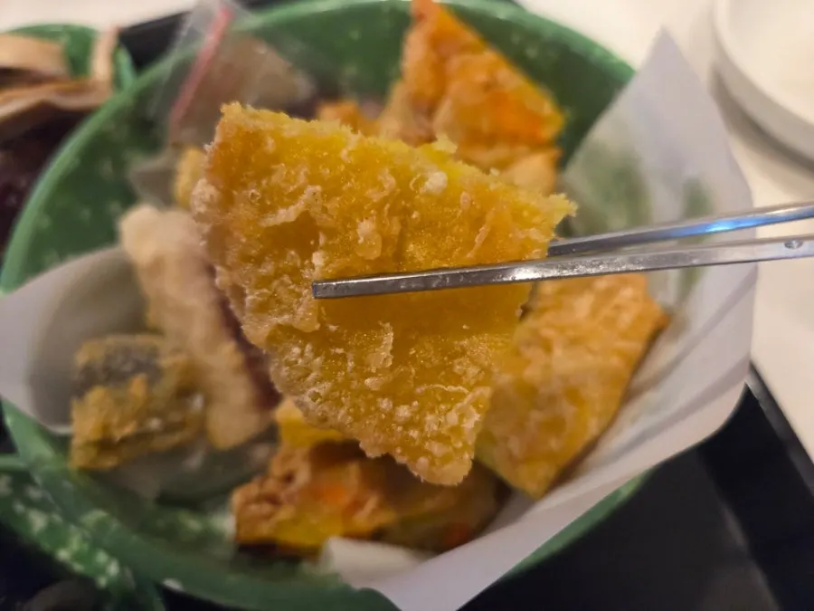 Fried squid snack with chunky pieces of squid visible