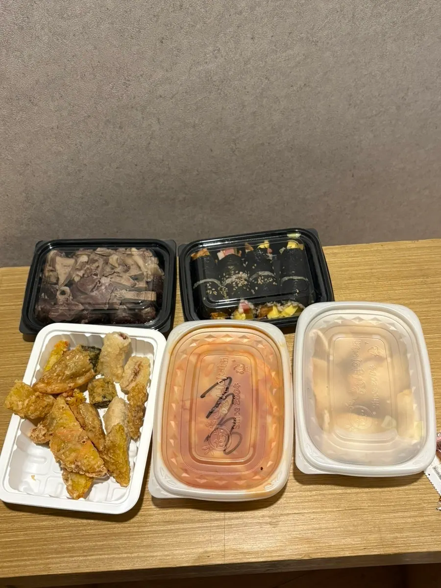Combo set with tteokbokki, odeng, fried snacks, sundae, and mini gimbap