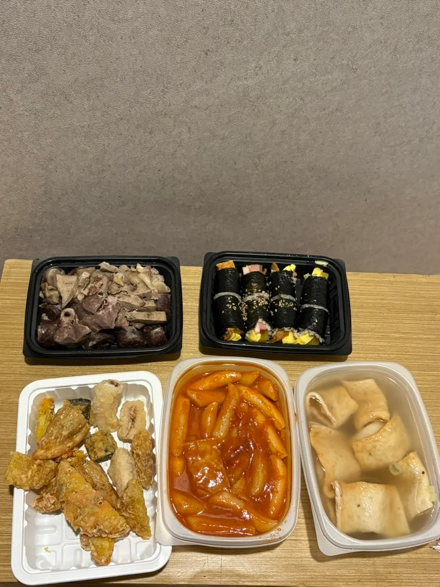 Generous portion of tteokbokki in a takeout container