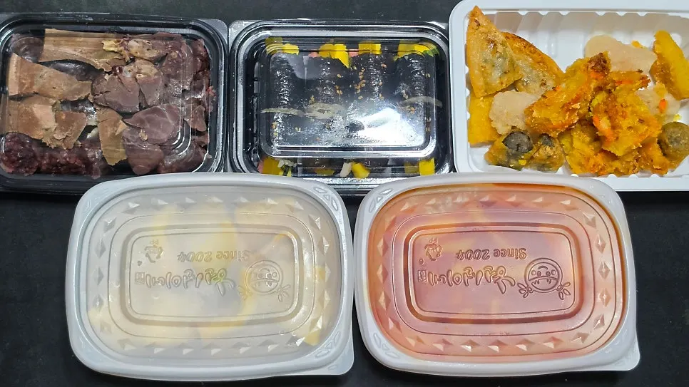 Hyeonseoni Combo Set with tteokbokki, fried snacks, sundae, gimbap, and fish cakes