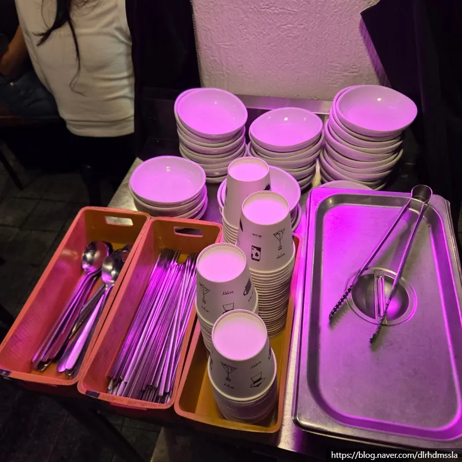Tables lined along a narrow aisle