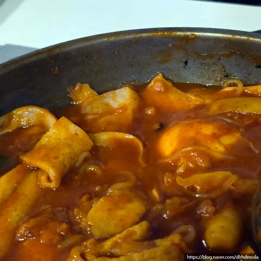 Tteokbokki and add-ins served on a small plate