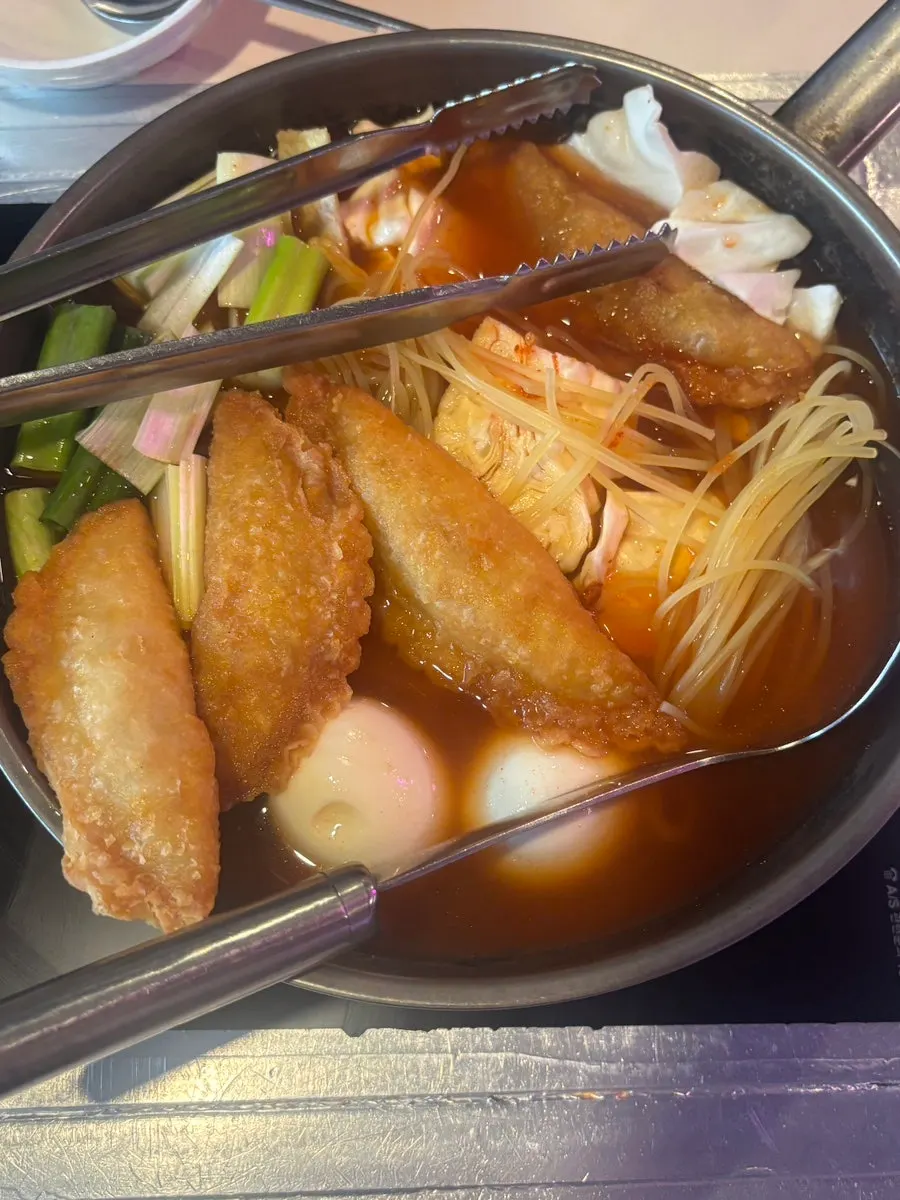 Pot of instant tteokbokki for two set on the table
