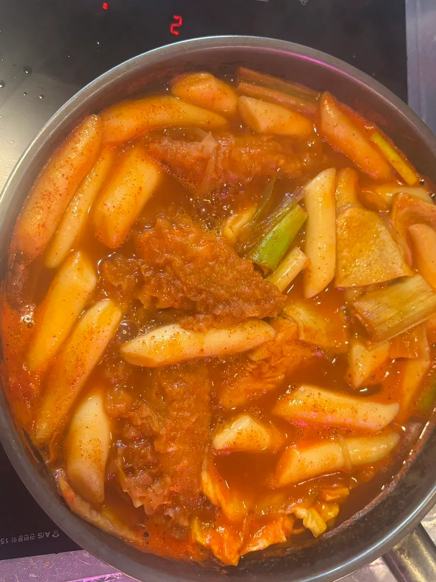 Instant tteokbokki with sauce soaked into the fish cake and cabbage