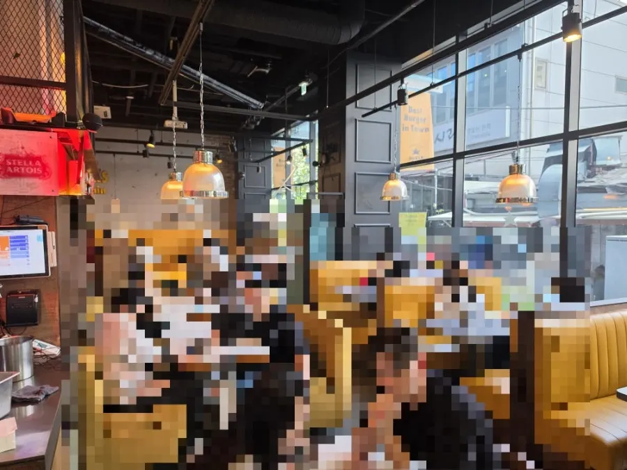 Interior with brick walls and yellow leather sofas